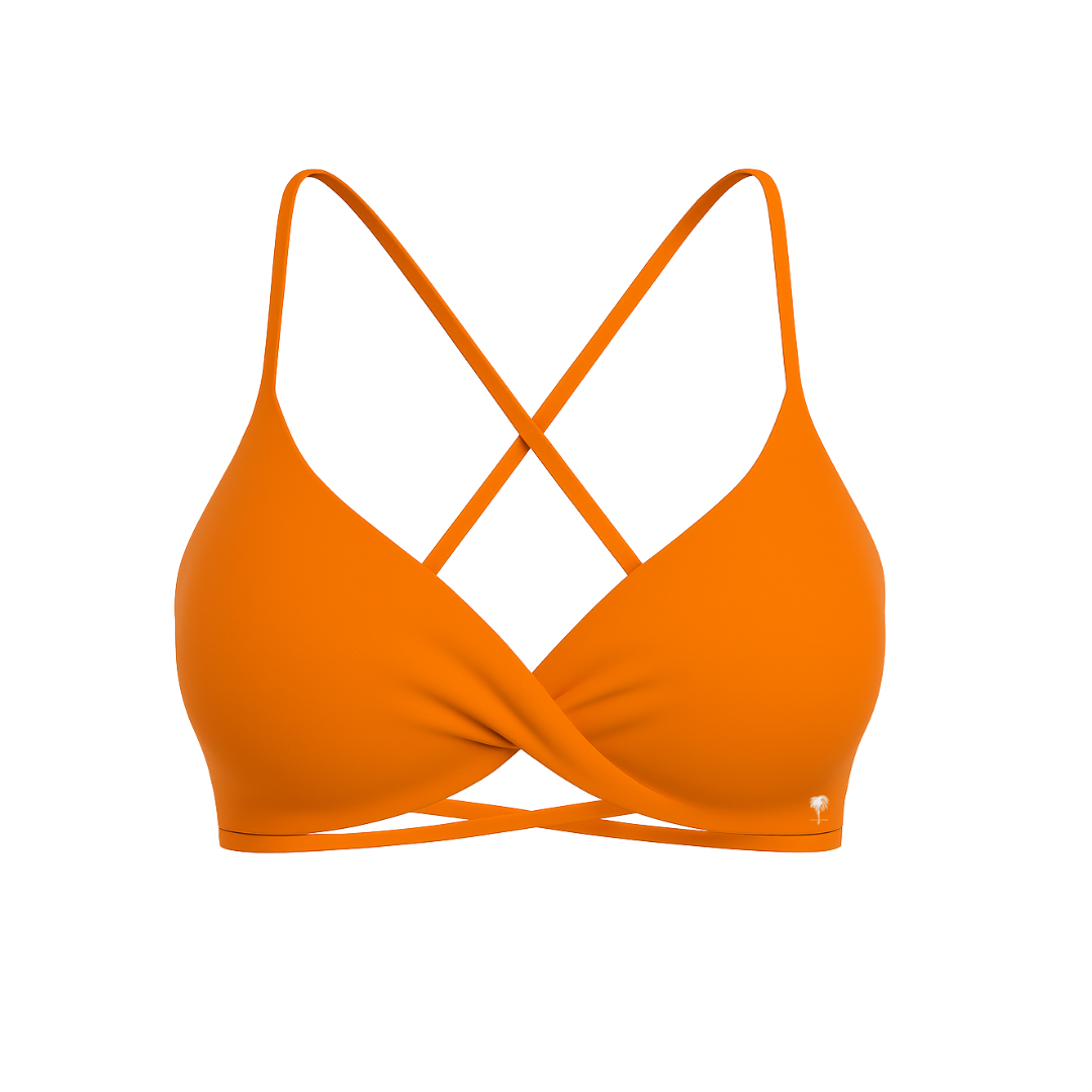 The Palm – CrossFlex™ Bra in orange. Sleek scoop neckline with criss-cross straps and wrap front detail, designed for flexible support and a flattering fit.