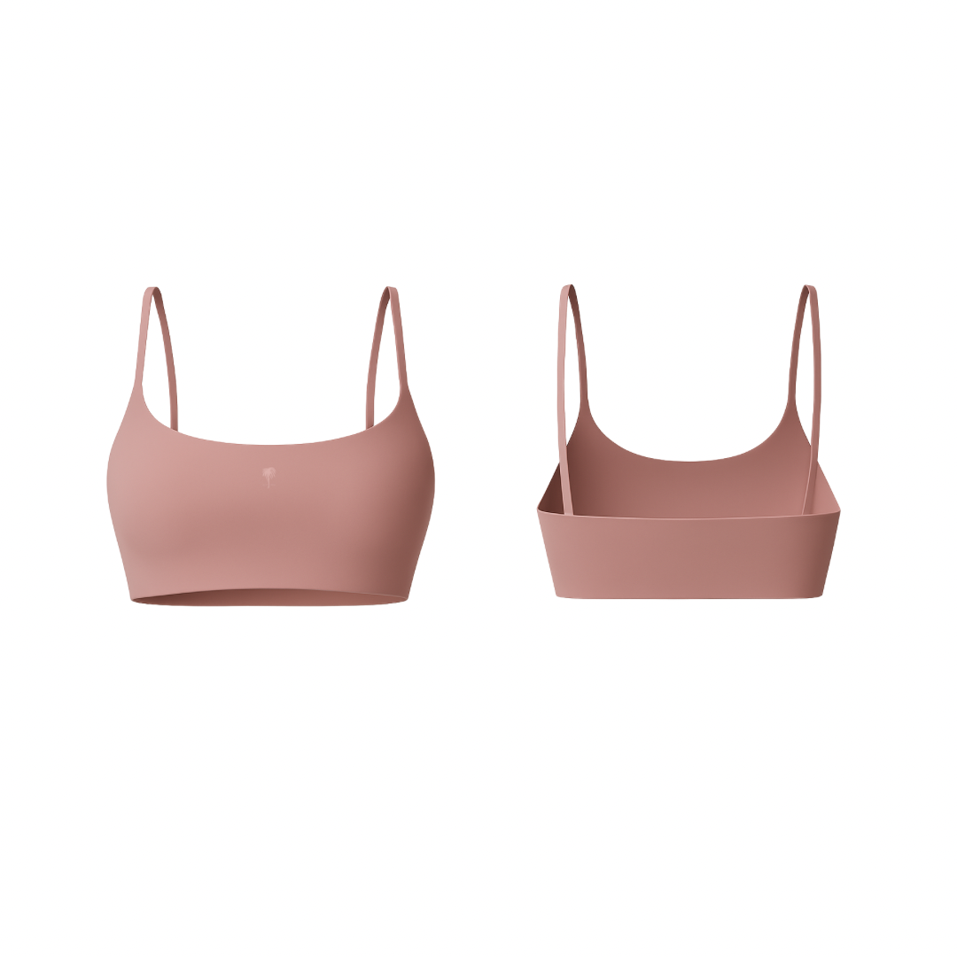 The Palm – FlexForm™ Bra in pink. Seamless, lightweight design with thin straps and a supportive fit, blending comfort and style for every workout.