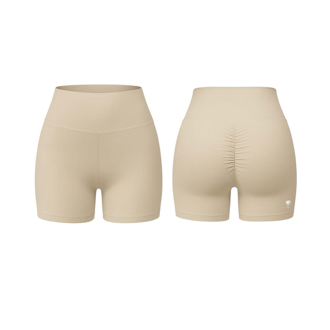 The Palm – QuickTone™ Jog Shorts in beige. Seamless high-rise design with back scrunch detail for a flattering, stay-put fit.