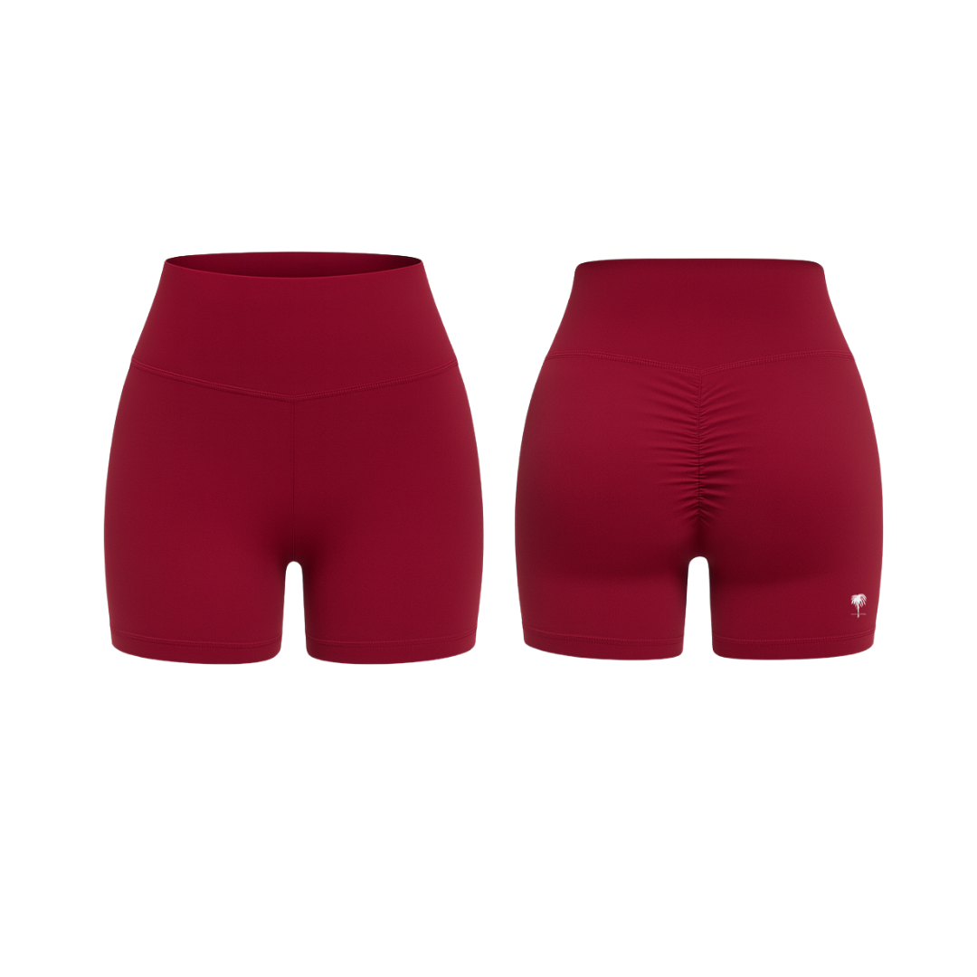 The Palm – QuickTone™ Jog Shorts in burgundy. Seamless high-rise design with back scrunch detail for a flattering, stay-put fit.