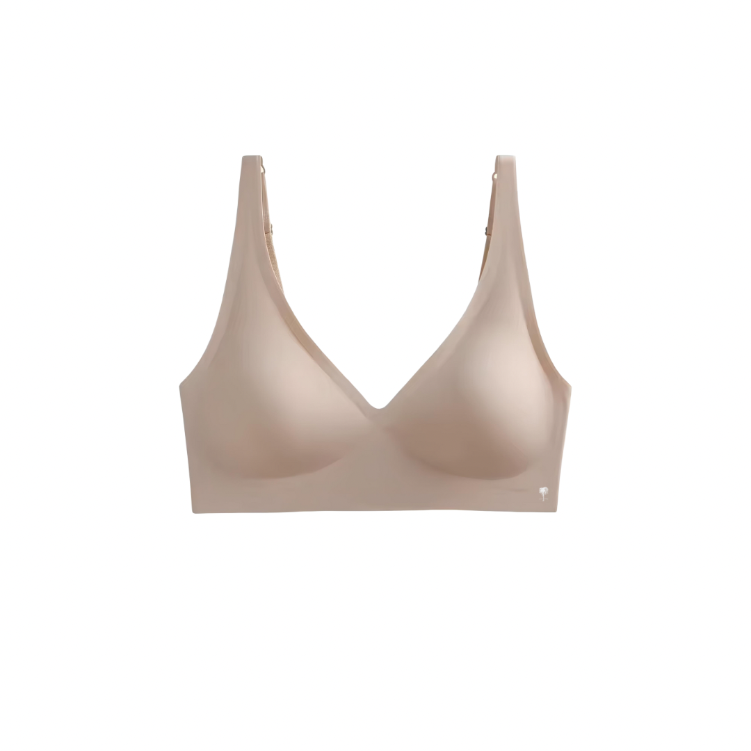 The Palm – SculptEase™ Bra Top in beige. Seamless wireless bra with thin molded cup, smooth finish and adjustable straps, offering lightweight sculpting support and everyday comfort.