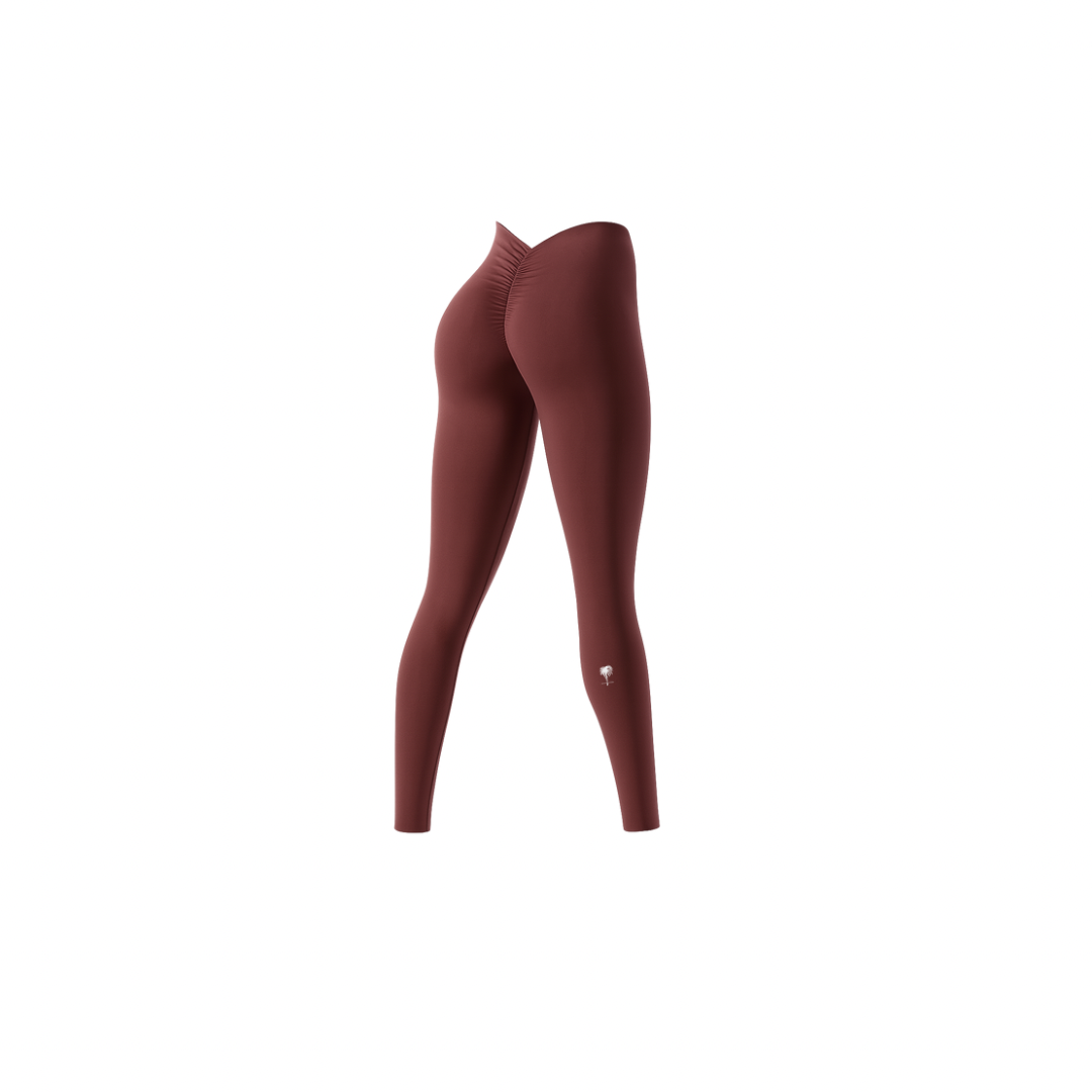 The Palm — Sculpted Leggings in maroon. High-waisted and ultra-soft, with scrunch back detail to enhance your curves. Minimal, seamless, and made to move with you.