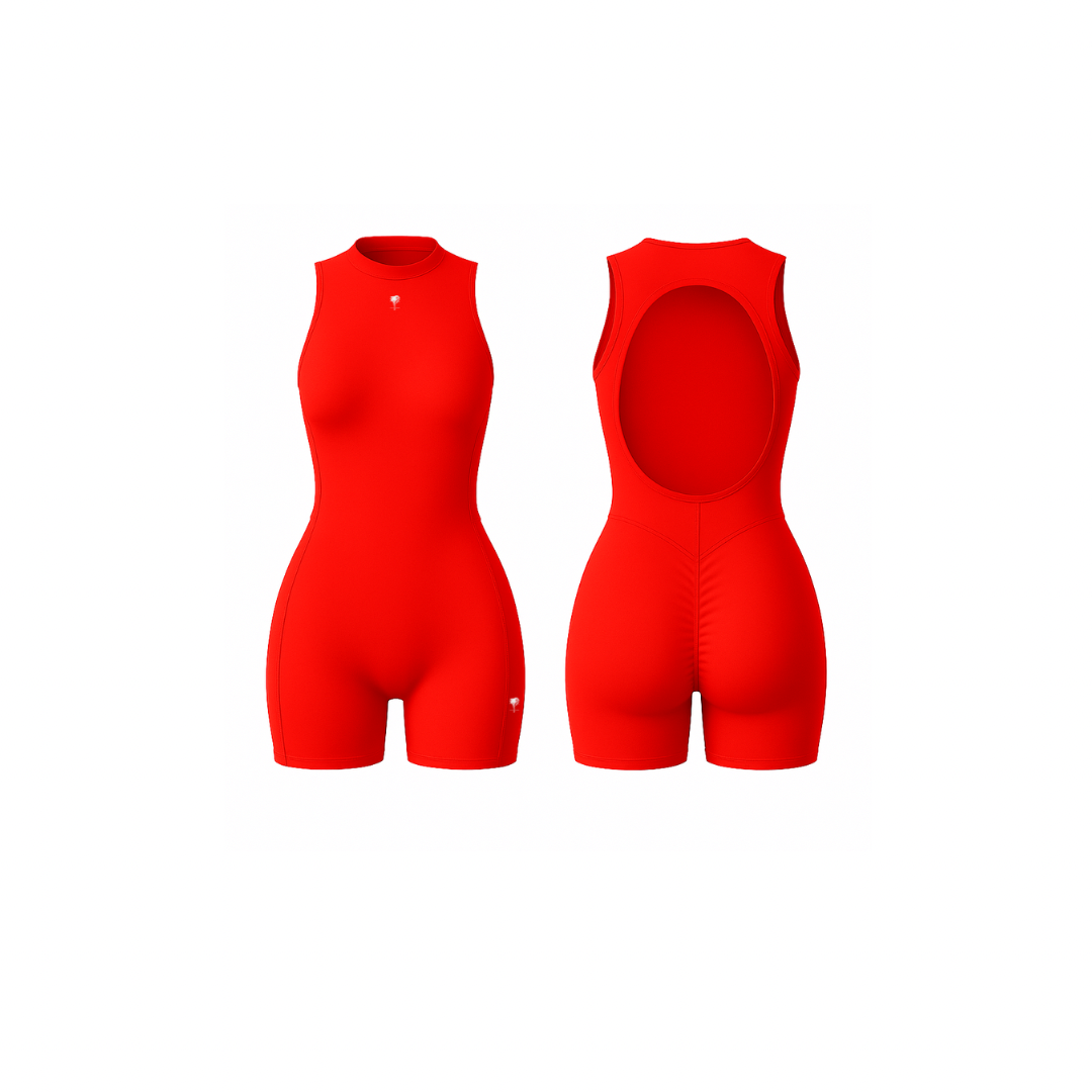 The Palm – SculptFX™ Backless in fire red. Sleek sleeveless romper with sculpted seam detailing, high round neckline and open back cut-out, designed for sleek shaping and all-day movement.