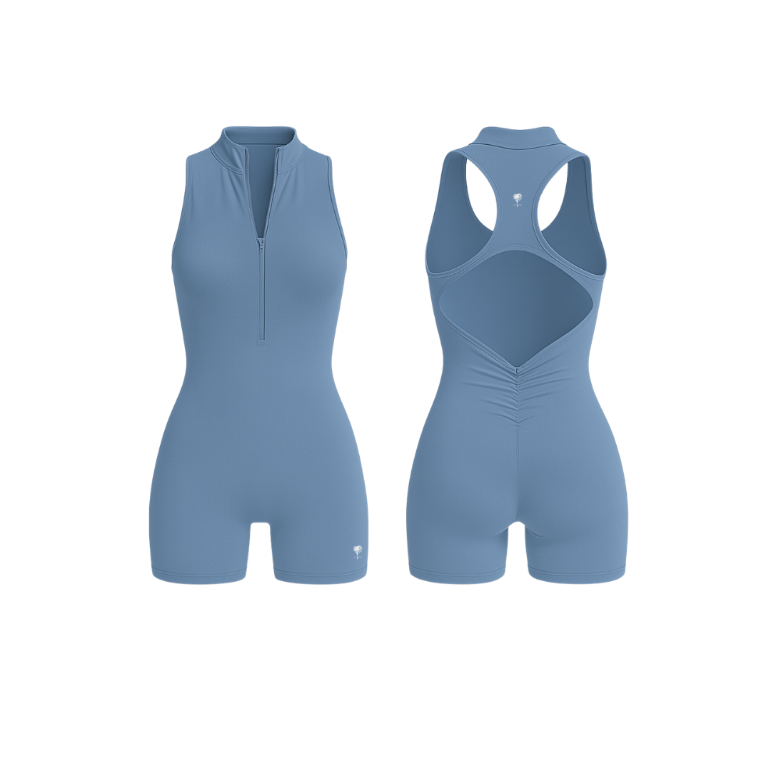 The Palm — SculptZip Romper in blue. High-neck, sleeveless one-piece with a front zipper and racerback design. Seamless, sculpting fit that hugs the body with second-skin softness. Built for movement, made to empower.