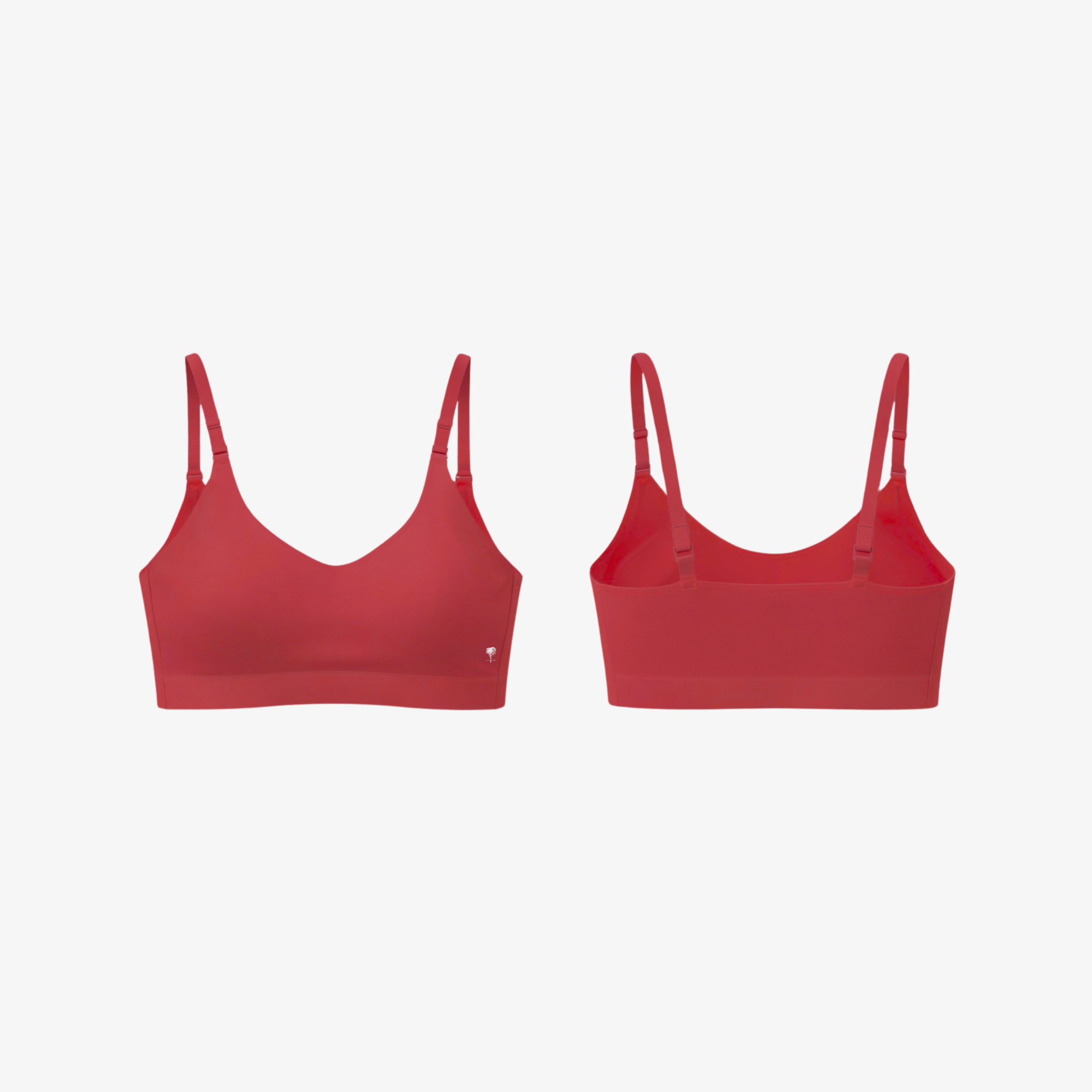 Vibrant red AirFit™ bra, showcasing the energetic color and smooth performance knit material.