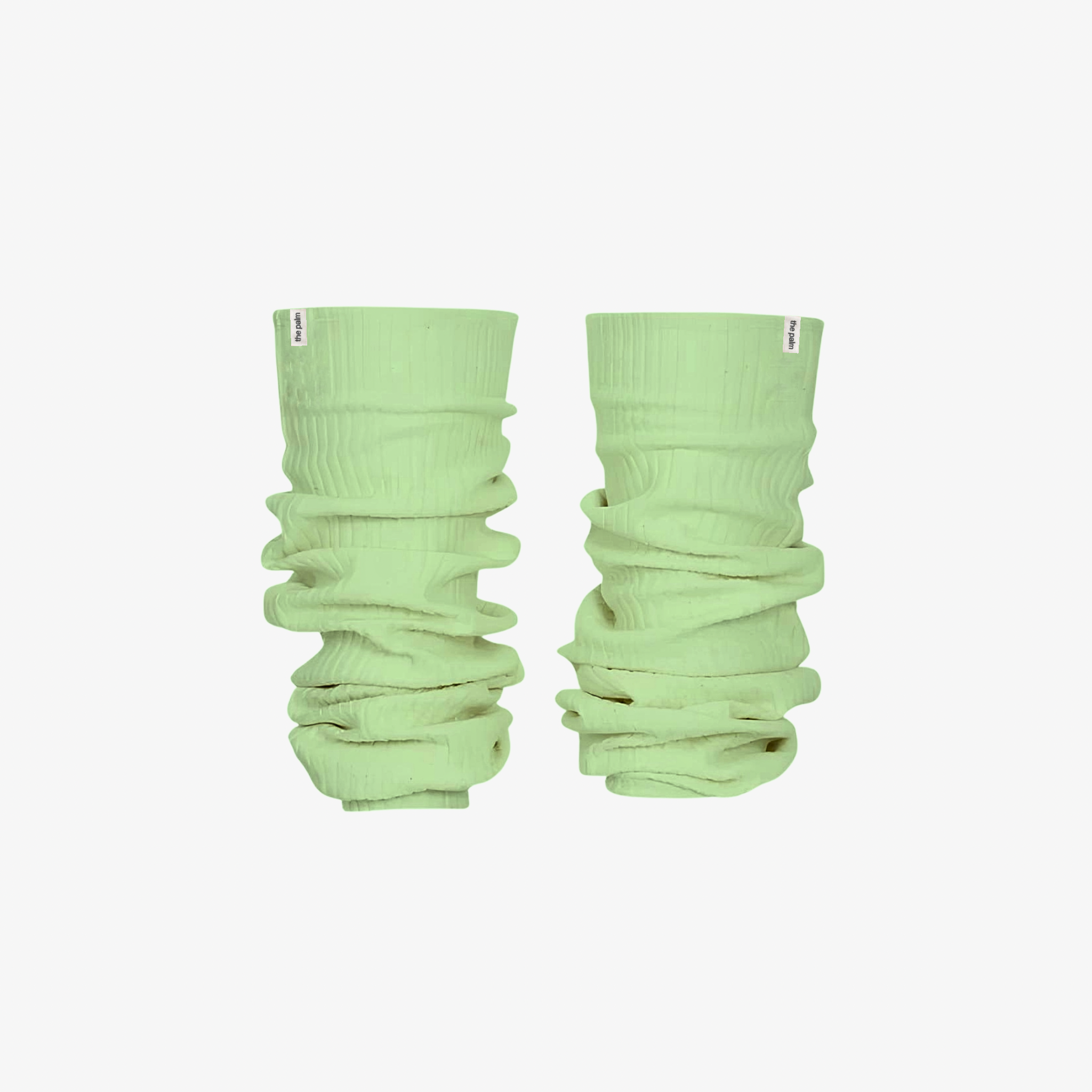 Green BalletEase™ warmers with a fresh, pastel tone and a smooth, flexible fit.