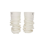 Ivory ribbed knit leg warmers by The Palm, featuring a minimalist logo tag and soft slouchy texture on a ivory white background1