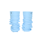 Ivory ribbed knit leg warmers by The Palm, featuring a minimalist logo tag and soft slouchy texture on a sky blue background1