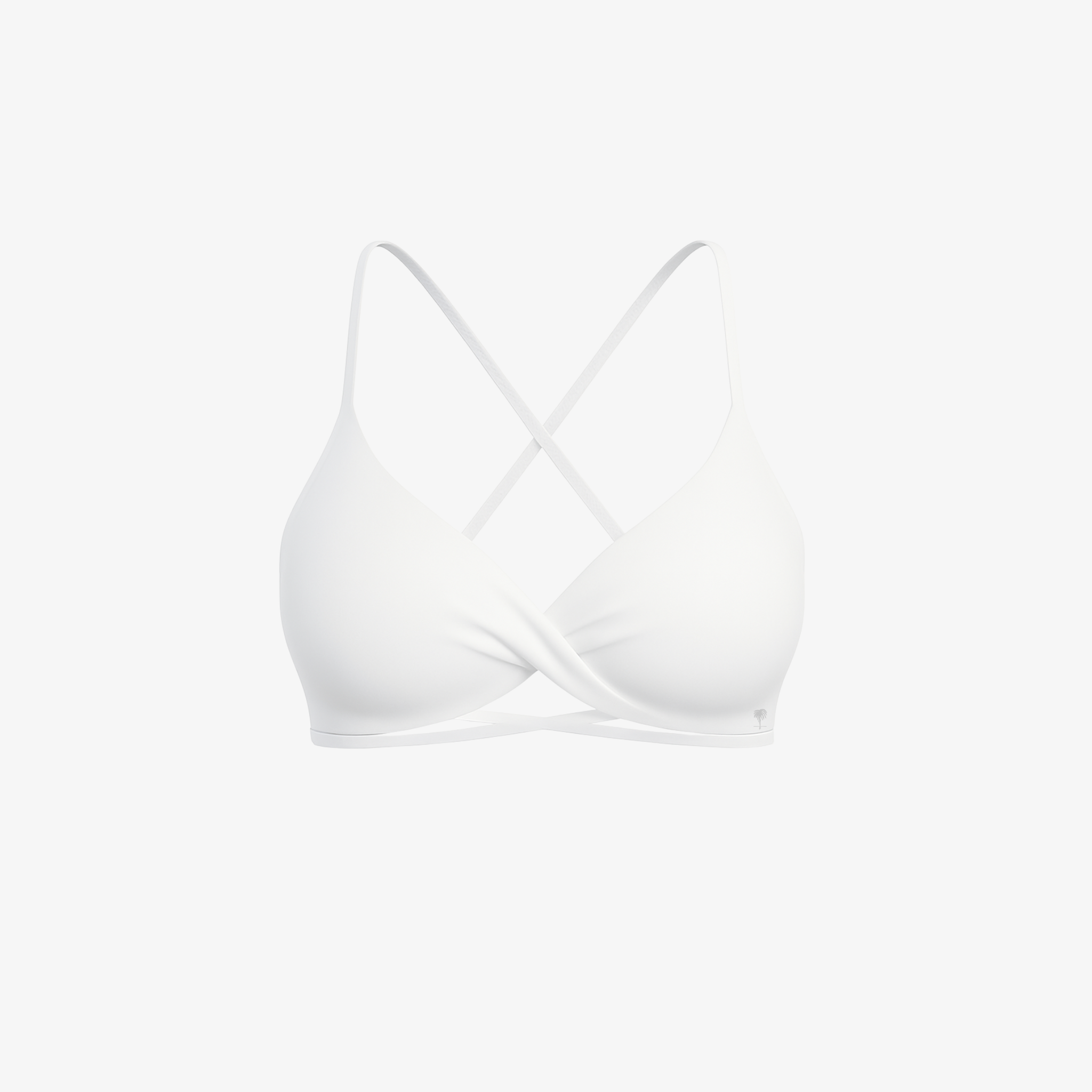 Minimalist White CrossFlex™ wire-free bra with removable pads and a clean, breathable silhouette.