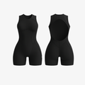 Sleek Jet Black FlowForm™ open-back romper by The Palm, featuring a sculpting second-skin fit and elegant back cutout.