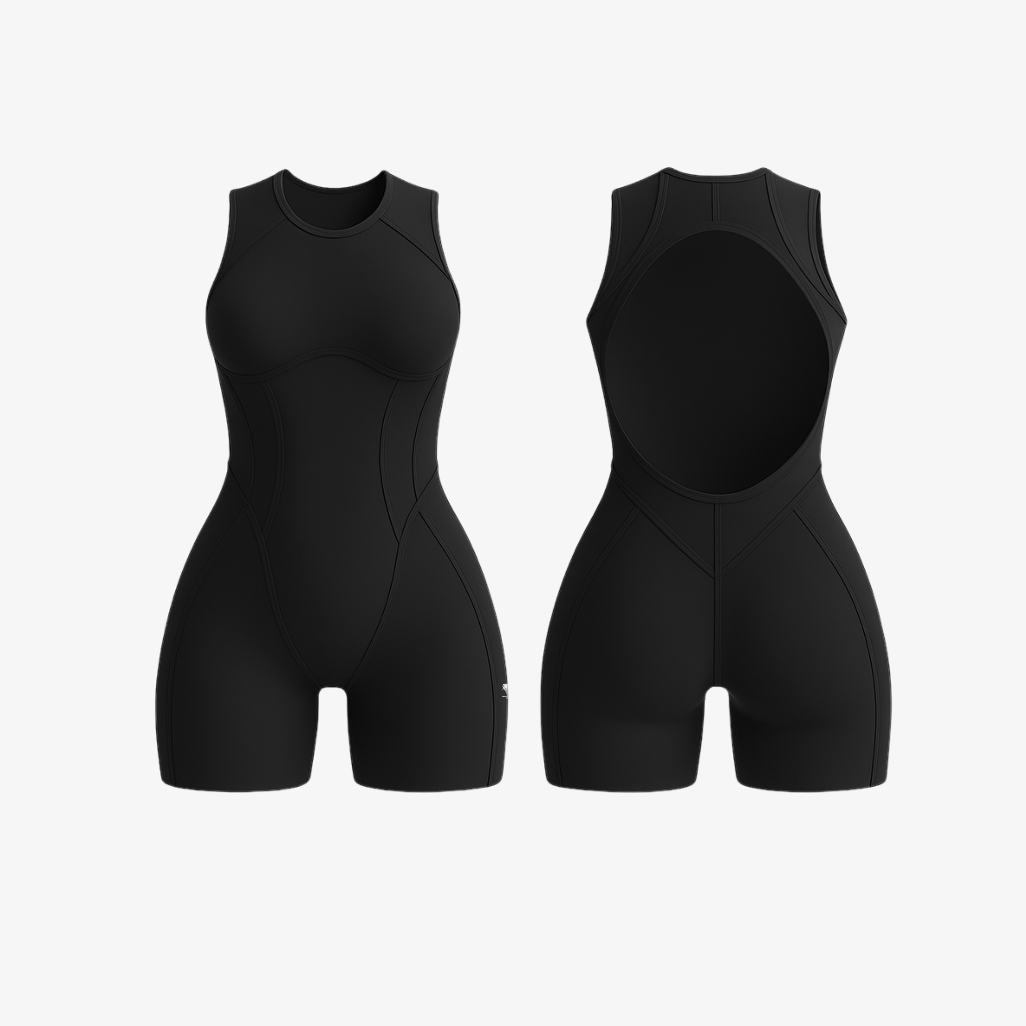 Sleek Jet Black FlowForm™ open-back romper by The Palm, featuring a sculpting second-skin fit and elegant back cutout.