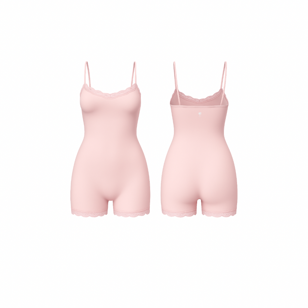 Minimalist seamless romper in rich blush pink shade with delicate lace trim and subtle Palm embroidery, front and back view on white background.