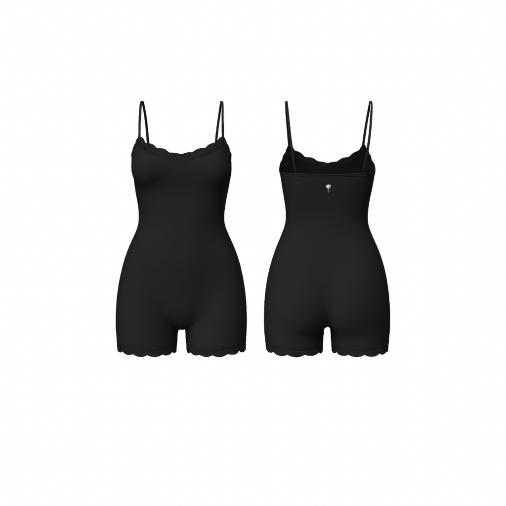 Minimalist seamless romper in rich jet black shade with delicate lace trim and subtle Palm embroidery, front and back view on white background.