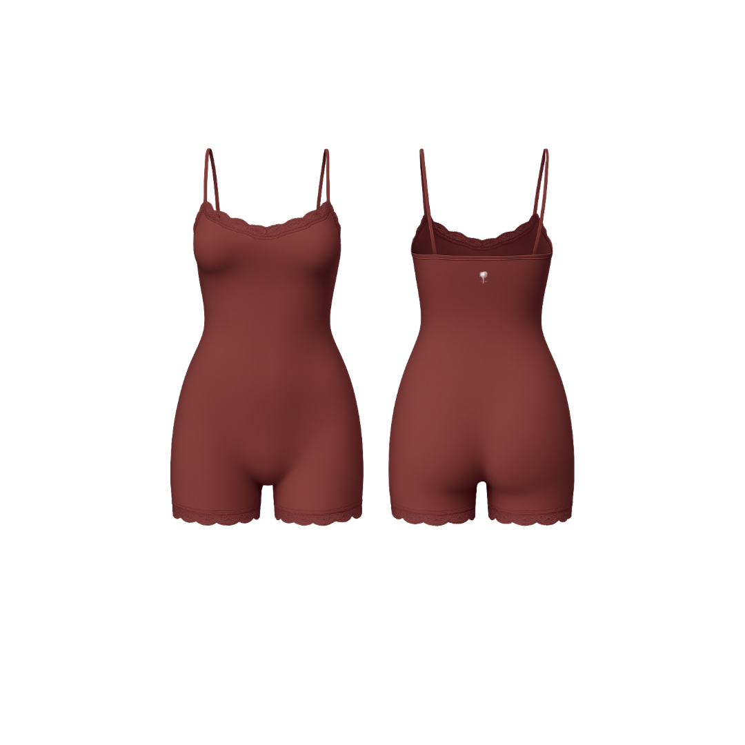 Minimalist seamless romper in rich rust cocoa shade with delicate lace trim and subtle Palm embroidery, front and back view on white background.