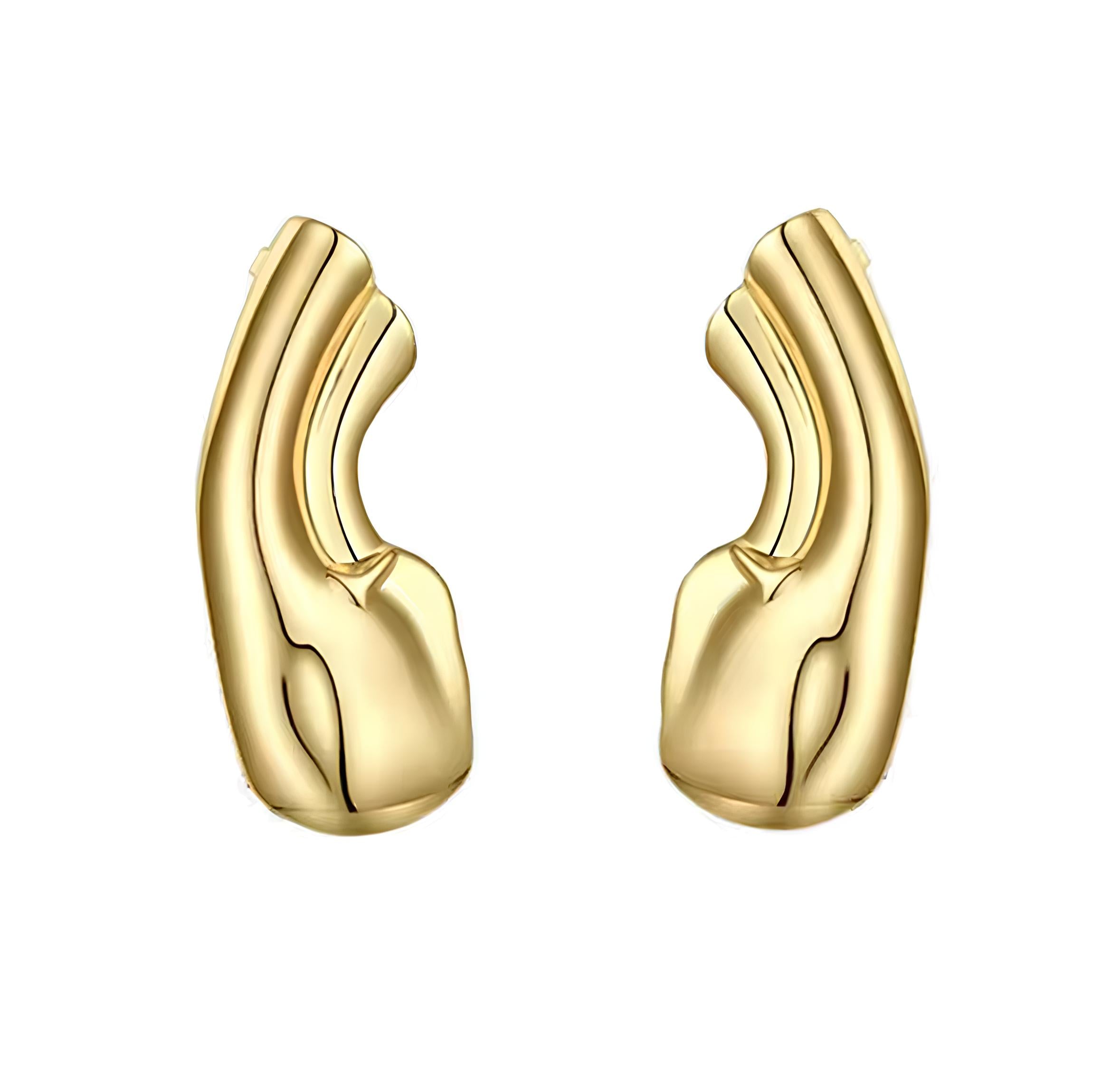 Minimalist gold sculptural cuffs with a fluid, organic shape on a white background 2