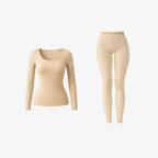 A bodily-toned seamless long-sleeve top and matching leggings, highlighting the "second skin" feel and minimalist design.