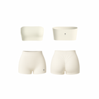 Minimalist beige bandeau and ruched shorts set — seamless, sculpting, and soft-touch design by The Palm.