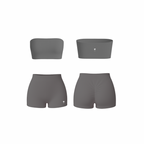 Minimalist silver bandeau and ruched shorts set — seamless, sculpting, and soft-touch design by The Palm.