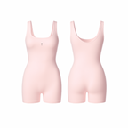 Seamless blush pink full-length sculpting one-piece with smooth compression and minimalist design, shown from front and back on a white background.