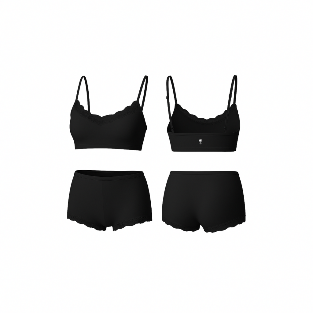 Seamless jet black loungewear set featuring a soft cropped top and matching high-waist shorts, shown from front and back on a white background.