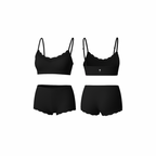 Seamless jet black loungewear set featuring a soft cropped top and matching high-waist shorts, shown from front and back on a white background.