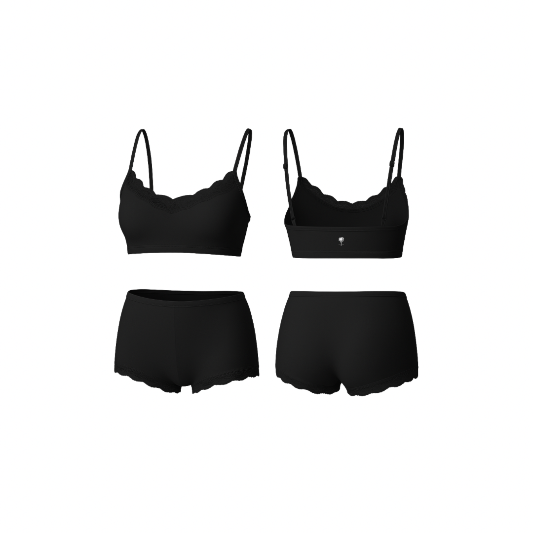 Seamless jet black loungewear set featuring a soft cropped top and matching high-waist shorts, shown from front and back on a white background.