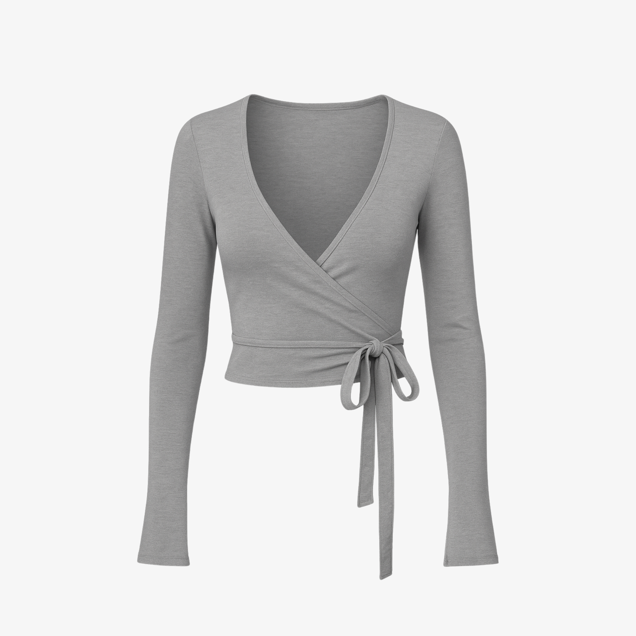 Muted Grey WrapLuxe™ top with soft drapes and sculpting stretch fabric, perfect for a studio-to-street look.