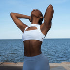 The Palm – Allure Curve Bra in white. Feminine sculpted fit with seamless stretch and soft cut-out neckline.
