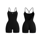 The Palm – BareForm™ Studio Romper in Black. Sculpting one-piece with cross-back straps and ruched detailing. Crafted for a second-skin fit that lifts and smooths, perfect for effortless styling and confident movement.