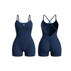 The Palm – BareForm™ Studio Romper in Navy. Seamless sculpting one-piece with cross-back straps and flattering ruching. Designed for performance, style, and movement with a second-skin fit and smooth finish. Confidence meets comfort.