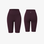 The Palm biker shorts in Wine. High-waisted sculpting fit in buttery soft stretch fabric, designed to contour the waist and enhance natural curves with a clean, minimal finish.
