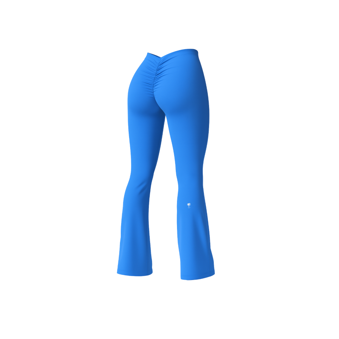 The Palm – BootyForm™ Flare in blue. Bold flared leggings with scrunch-back detail, high-waist support and contouring stretch fabric for a dynamic statement look.