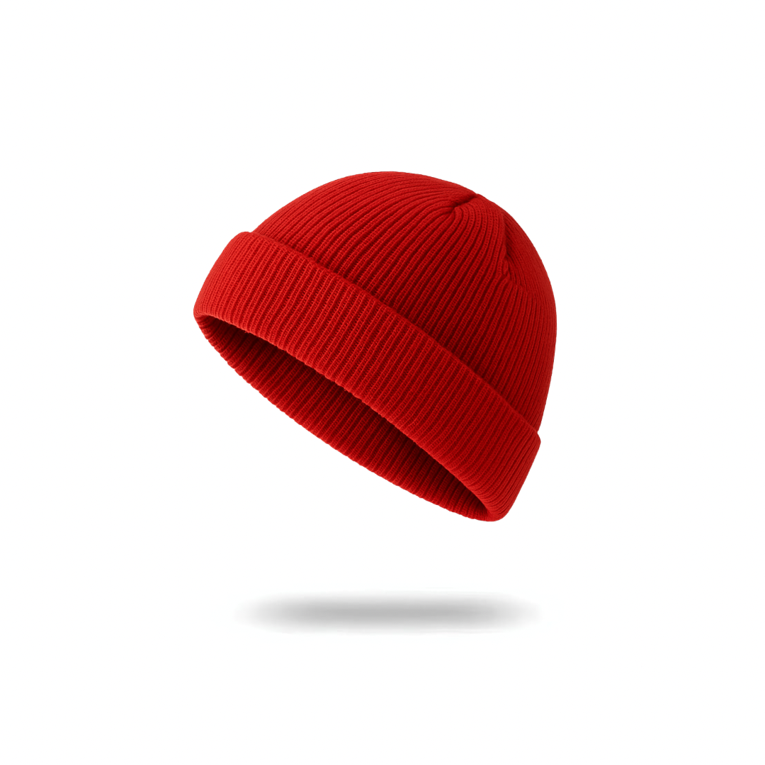 A soft rib-knit beanie from The Palm in fire red, designed for a cozy, close fit and everyday warmth. Clean minimalist silhouette with a folded cuff for elevated winter styling.