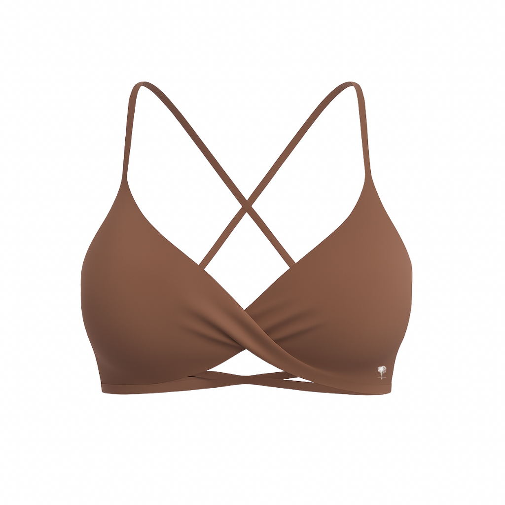 The Palm – CrossFlex™ Bra in brown. Sleek scoop neckline with criss-cross straps and wrap front detail, designed for flexible support and a flattering fit.