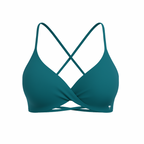 The Palm – CrossFlex™ Bra in teal. Sleek scoop neckline with criss-cross straps and wrap front detail, designed for flexible support and a flattering fit.