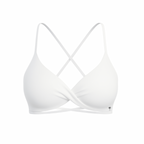 The Palm – CrossFlex™ Bra in white. Sleek scoop neckline with criss-cross straps and wrap front detail, designed for flexible support and a flattering fit.