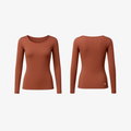 The Palm long sleeve activewear top in Cinnamon Clay. Contouring slim-fit design crafted from breathable performance fabric, creating a clean and feminine athletic silhouette.
