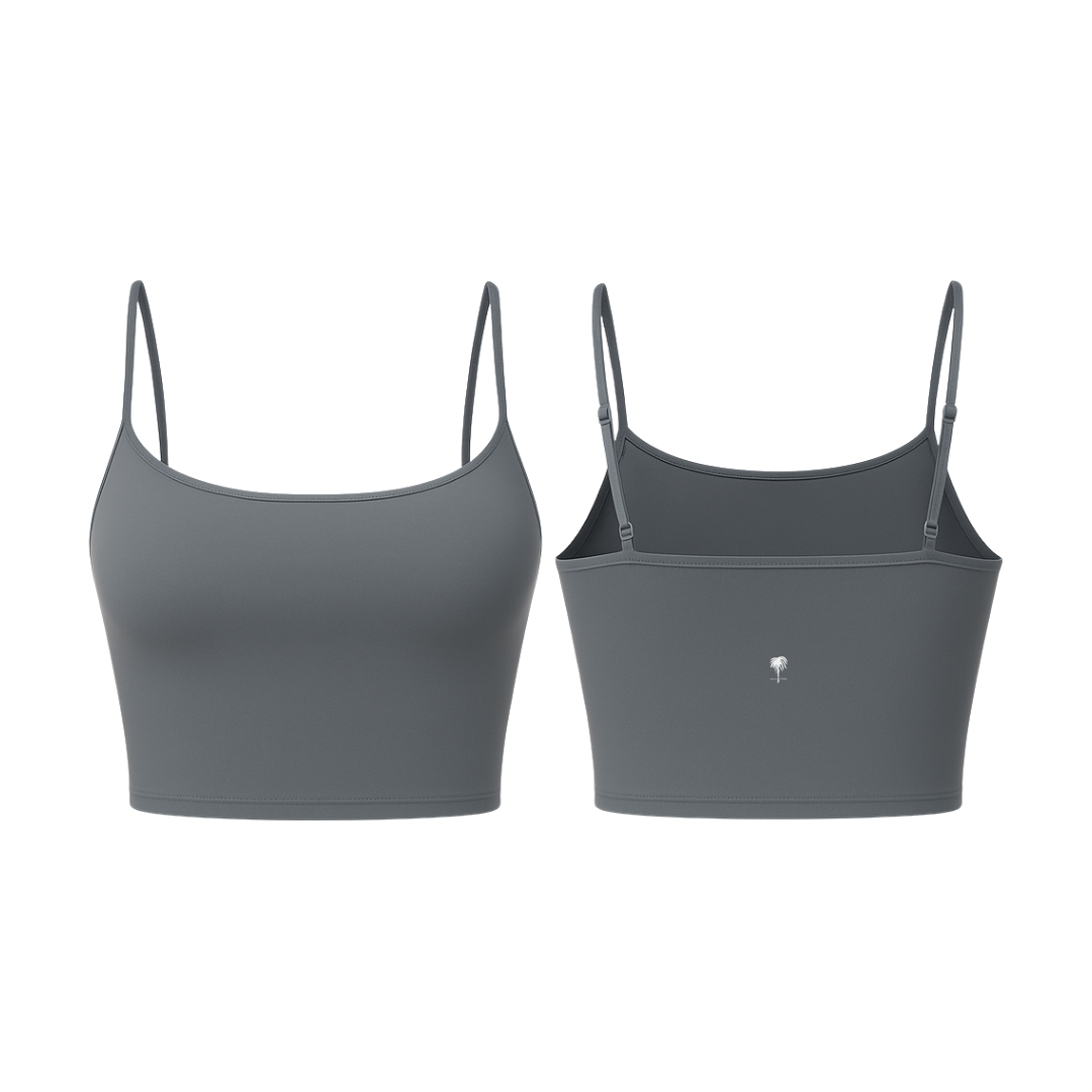 The Palm – PalmSoft™ Crop Top in graphite gray. Minimalist seamless design with thin adjustable straps and a smooth matte finish, offering a second-skin feel and gentle support for everyday wear.