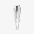 The Palm PolkaSkin™ Tights in Ivory. Delicate sheer tights featuring a timeless polka-dot pattern, lightweight comfort, and an elegant second-skin feel.