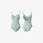 The Palm PureForm™ Body in silver-mist. Seamless sculpting bodysuit crafted from buttery-soft stretch fabric with a second-skin fit and clean, minimalist lines.
