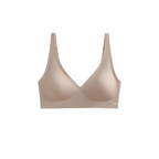 The Palm – SculptEase™ Bra Top in beige. Seamless wireless bra with thin molded cup, smooth finish and adjustable straps, offering lightweight sculpting support and everyday comfort.