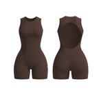 The Palm – SculptForm™ Romper in brown. Sleek sleeveless one-piece with contour seam detailing, round neckline and bold open back, designed for a sculpted silhouette and freedom of movement.