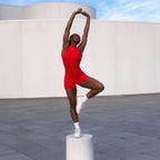 The Palm SculptFX™ Backless in Fire Sculpt. A bold red sculpting bodysuit with open-back design and soft compression that enhances curves with confident structure.