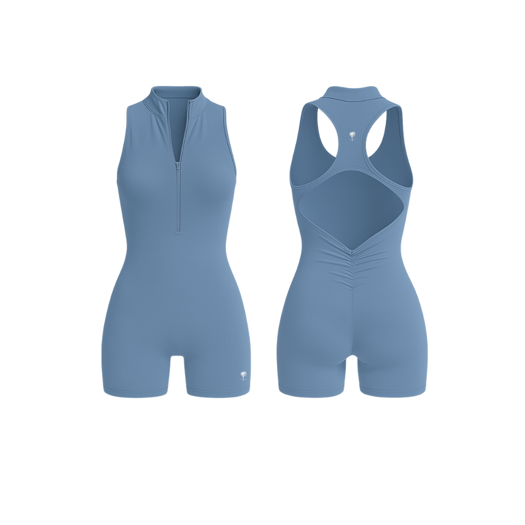 The Palm — SculptZip Romper in blue. High-neck, sleeveless one-piece with a front zipper and racerback design. Seamless, sculpting fit that hugs the body with second-skin softness. Built for movement, made to empower.