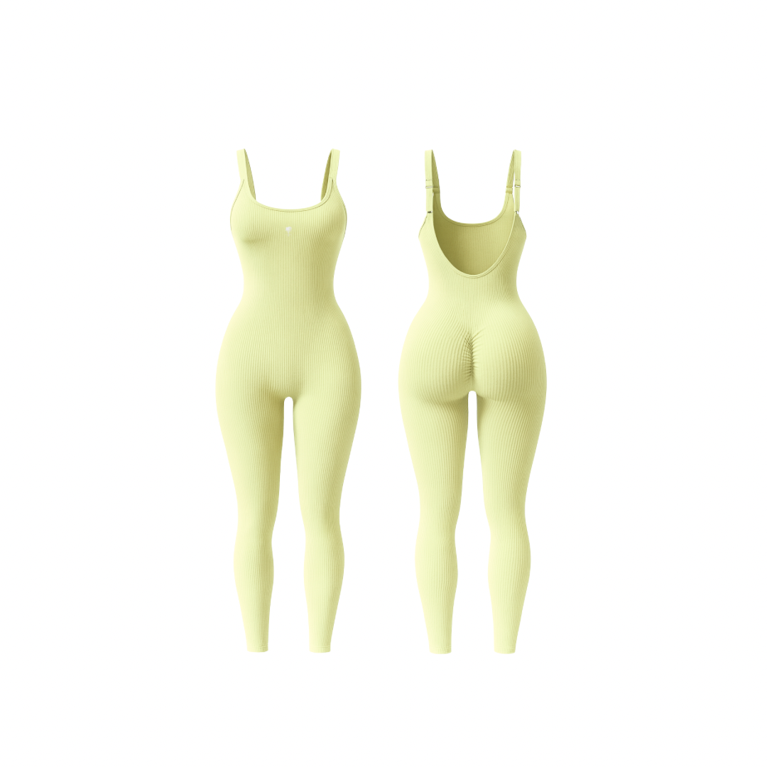 The Palm – ShapeFlex™ Suit in light yellow. Seamless full-length ribbed bodysuit with sculpting compression, four-way stretch, and second-skin fit. Designed to accentuate curves while allowing total freedom of movement, this versatile piece transitions effortlessly from studio to street with moisture-wicking fabric and a sleek, contour-hugging silhouette.