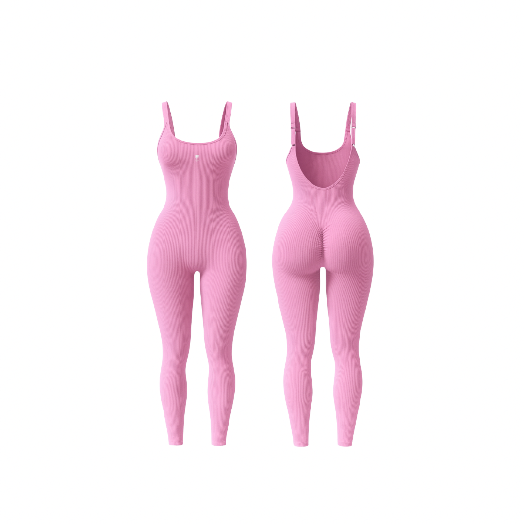 The Palm – ShapeFlex™ Suit in pink. Seamless full-length ribbed bodysuit with sculpting compression, four-way stretch, and second-skin fit. Designed to accentuate curves while allowing total freedom of movement, this versatile piece transitions effortlessly from studio to street with moisture-wicking fabric and a sleek, contour-hugging silhouette.