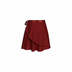 The Palm – SilkWave™ Skirt in red. Elegant wrap-style skirt crafted from a silky soft, lightweight fabric that flows beautifully with every movement. Designed with a flattering drape and adjustable tie waist, it’s perfect for layering over activewear or styling as a chic everyday piece.