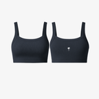 The Palm SoftRib™ Top in grey, front view showcasing a smooth ribbed texture and minimalist silhouette.