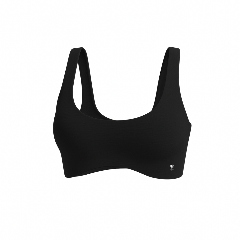 The Palm — SoftSculpt Bra in black. Seamless, second-skin feel with a flattering scoop neckline and wide straps for natural lift and support. Soft, minimal, and made to move with you.
