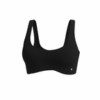 The Palm — SoftSculpt Bra in black. Seamless, second-skin feel with a flattering scoop neckline and wide straps for natural lift and support. Soft, minimal, and made to move with you.